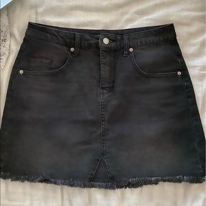 Black denim mini skirt